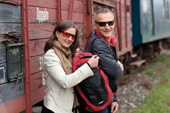 Image of couple using ImproVision Sunsheilds while travelling