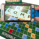 The Compact GO looking down on a Scrabble board